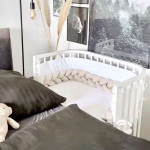 Witte co-sleeper wieg